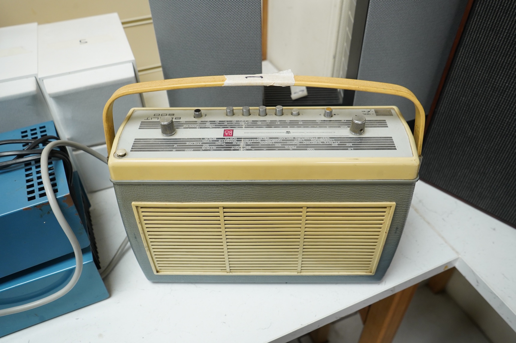 Six Bang & Olufsen items; a 1960s Beolit 600 radio, a pair of Beovox CX50s white cased shelf speakers, a pair of Beovox 1000 speakers, a Beolab 2000 speaker unit, together with two testing units (adjustable power supplie
